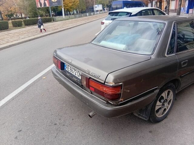 Серый Тойота Камри, объемом двигателя 2 л и пробегом 359 тыс. км за 1300 $, фото 3 на Automoto.ua