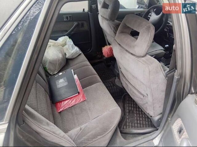 Сірий Тойота Камрі, об'ємом двигуна 2 л та пробігом 359 тис. км за 1399 $, фото 3 на Automoto.ua