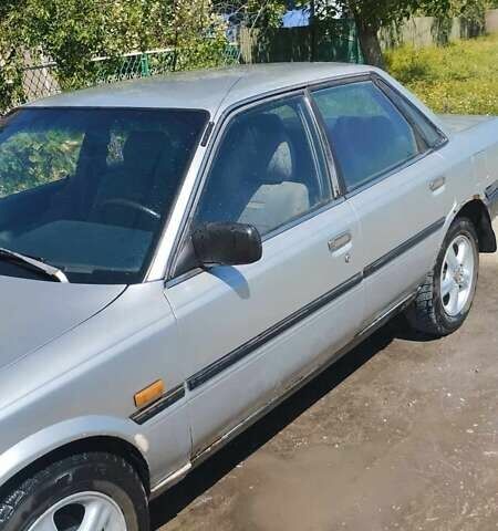 Серый Тойота Камри, объемом двигателя 2 л и пробегом 504 тыс. км за 1700 $, фото 1 на Automoto.ua