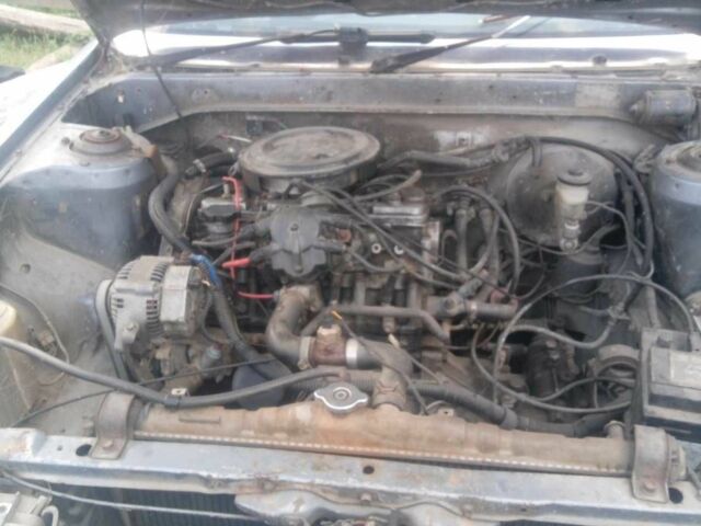 Серый Тойота Камри, объемом двигателя 2 л и пробегом 350 тыс. км за 550 $, фото 1 на Automoto.ua