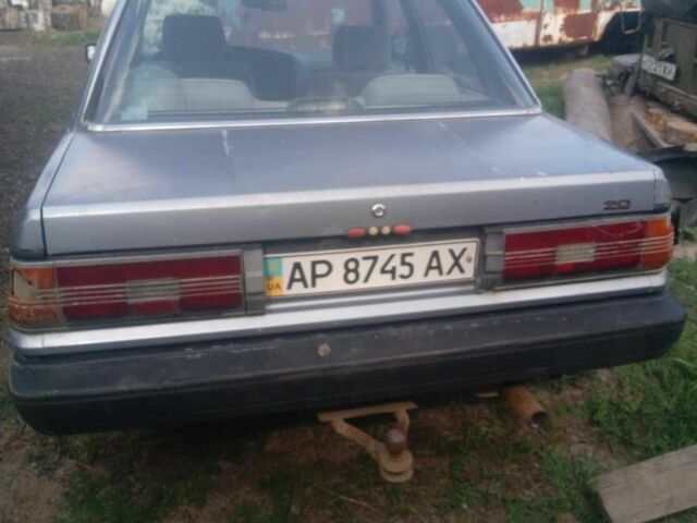 Серый Тойота Камри, объемом двигателя 2 л и пробегом 350 тыс. км за 550 $, фото 2 на Automoto.ua