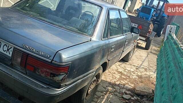 Серый Тойота Камри, объемом двигателя 2 л и пробегом 455 тыс. км за 450 $, фото 3 на Automoto.ua