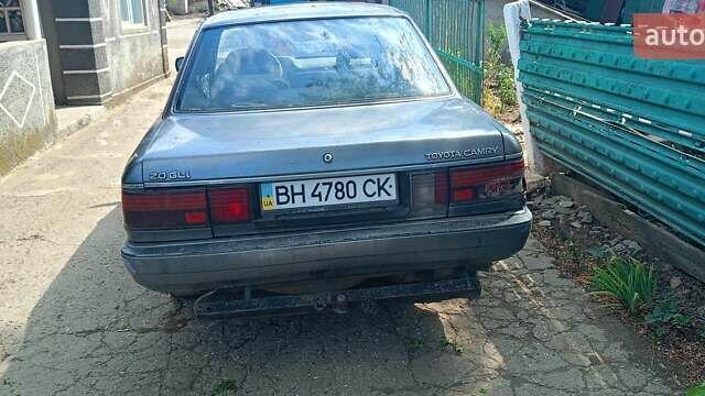 Серый Тойота Камри, объемом двигателя 2 л и пробегом 455 тыс. км за 450 $, фото 4 на Automoto.ua