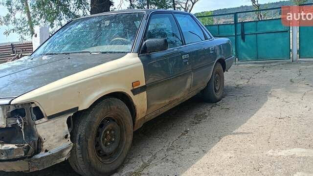 Серый Тойота Камри, объемом двигателя 2 л и пробегом 455 тыс. км за 450 $, фото 7 на Automoto.ua