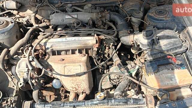 Серый Тойота Камри, объемом двигателя 2 л и пробегом 455 тыс. км за 450 $, фото 1 на Automoto.ua