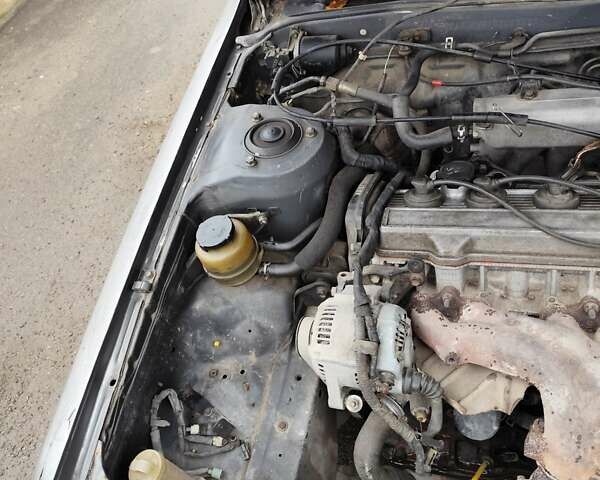 Серый Тойота Камри, объемом двигателя 2 л и пробегом 528 тыс. км за 950 $, фото 11 на Automoto.ua