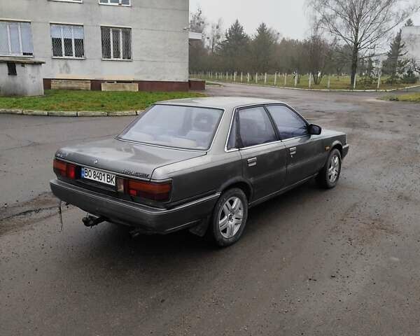 Серый Тойота Камри, объемом двигателя 2 л и пробегом 528 тыс. км за 950 $, фото 3 на Automoto.ua