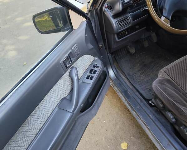 Серый Тойота Камри, объемом двигателя 2 л и пробегом 528 тыс. км за 1101 $, фото 6 на Automoto.ua