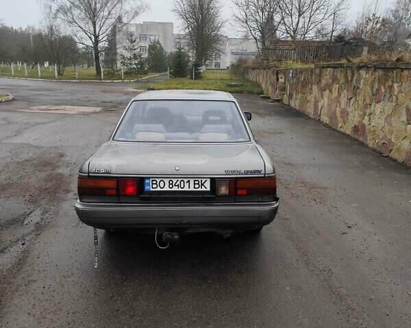 Серый Тойота Камри, объемом двигателя 2 л и пробегом 528 тыс. км за 950 $, фото 4 на Automoto.ua