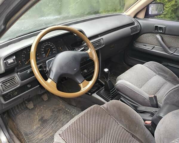 Серый Тойота Камри, объемом двигателя 2 л и пробегом 528 тыс. км за 1000 $, фото 4 на Automoto.ua