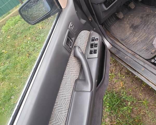 Серый Тойота Камри, объемом двигателя 2 л и пробегом 528 тыс. км за 1000 $, фото 3 на Automoto.ua