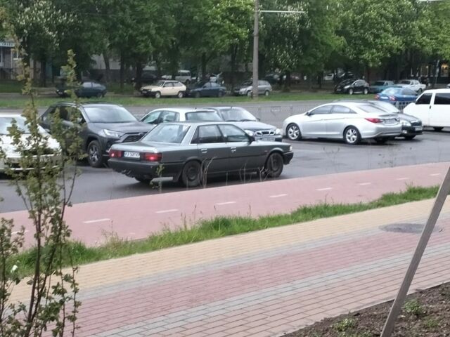 Серый Тойота Камри, объемом двигателя 2 л и пробегом 396 тыс. км за 1432 $, фото 6 на Automoto.ua