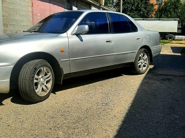 Сірий Тойота Камрі, об'ємом двигуна 2.2 л та пробігом 325 тис. км за 1950 $, фото 4 на Automoto.ua