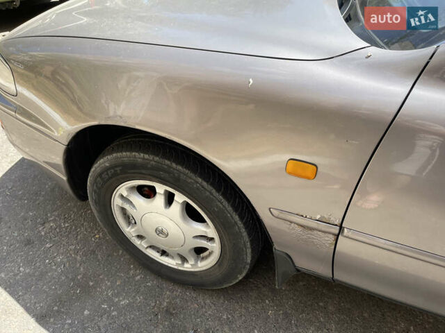 Сірий Тойота Камрі, об'ємом двигуна 2.2 л та пробігом 354 тис. км за 3500 $, фото 4 на Automoto.ua