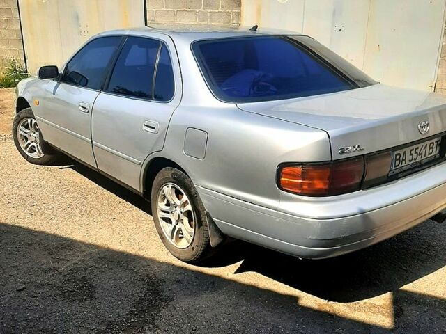 Сірий Тойота Камрі, об'ємом двигуна 2.2 л та пробігом 325 тис. км за 1950 $, фото 5 на Automoto.ua