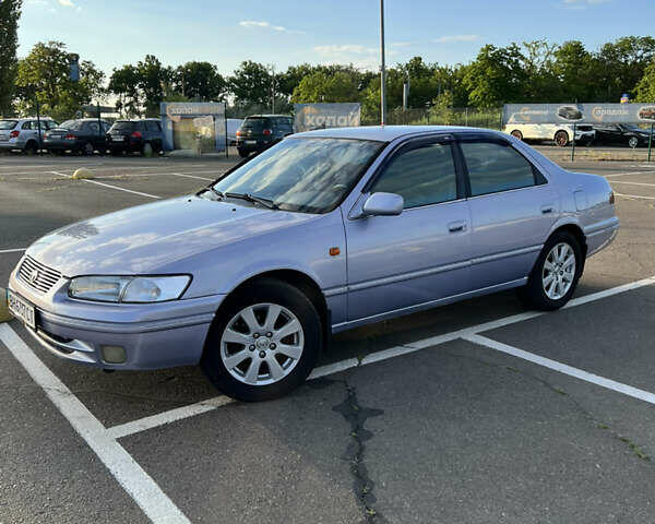 Серый Тойота Камри, объемом двигателя 3 л и пробегом 431 тыс. км за 4500 $, фото 1 на Automoto.ua