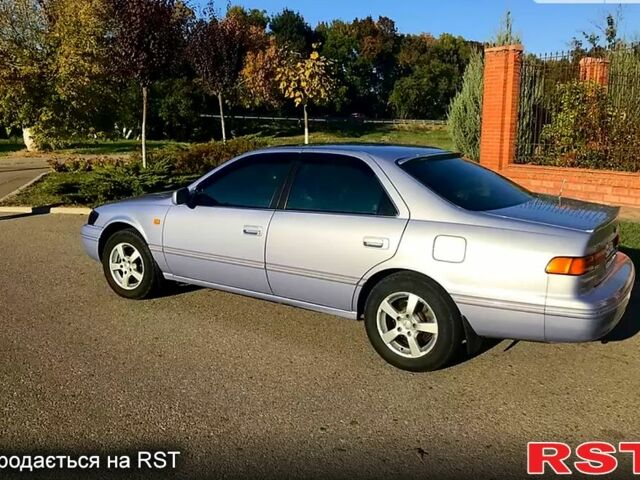 Серый Тойота Камри, объемом двигателя 3 л и пробегом 267 тыс. км за 5500 $, фото 2 на Automoto.ua