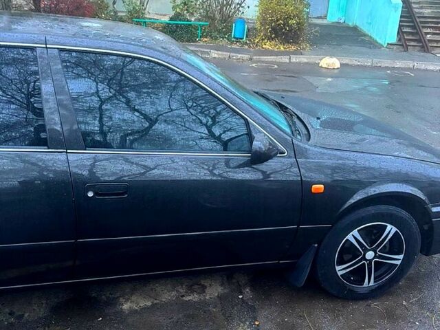 Сірий Тойота Камрі, об'ємом двигуна 2.2 л та пробігом 263 тис. км за 3300 $, фото 5 на Automoto.ua