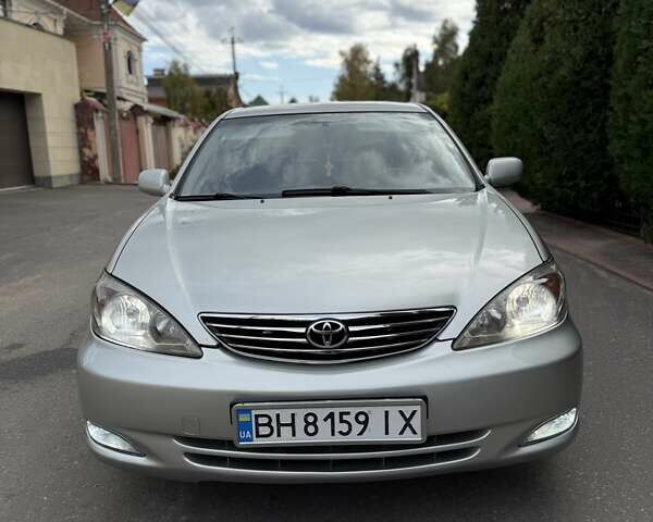 Сірий Тойота Камрі, об'ємом двигуна 3 л та пробігом 215 тис. км за 6800 $, фото 54 на Automoto.ua