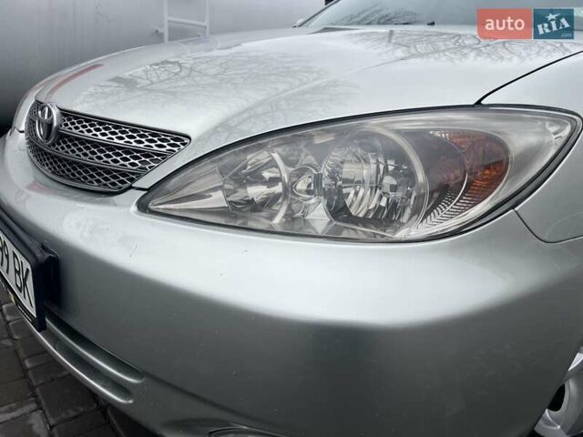 Сірий Тойота Камрі, об'ємом двигуна 2.4 л та пробігом 216 тис. км за 5999 $, фото 13 на Automoto.ua
