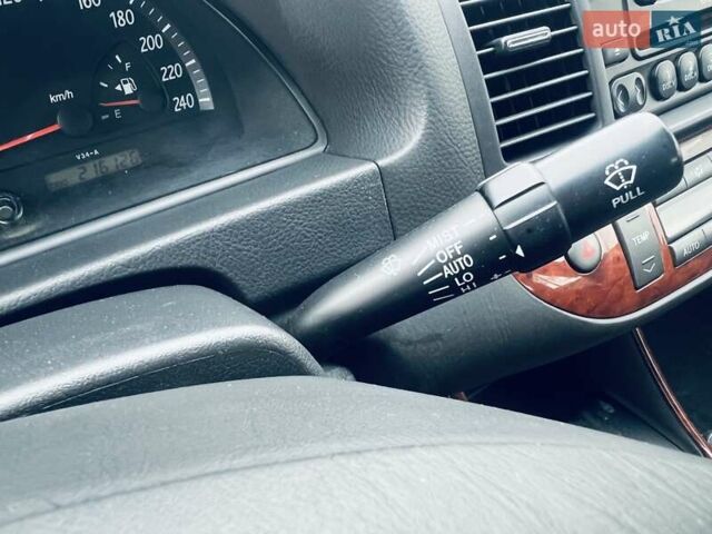 Сірий Тойота Камрі, об'ємом двигуна 2.4 л та пробігом 216 тис. км за 5999 $, фото 35 на Automoto.ua