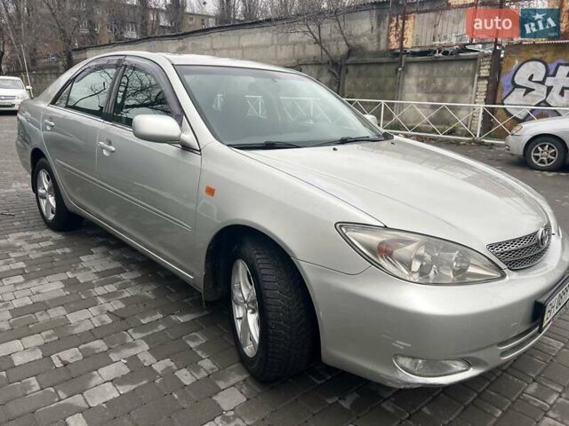 Сірий Тойота Камрі, об'ємом двигуна 2.4 л та пробігом 216 тис. км за 5999 $, фото 8 на Automoto.ua