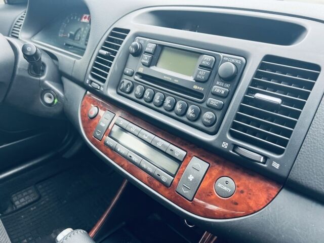 Сірий Тойота Камрі, об'ємом двигуна 2.4 л та пробігом 216 тис. км за 5999 $, фото 13 на Automoto.ua