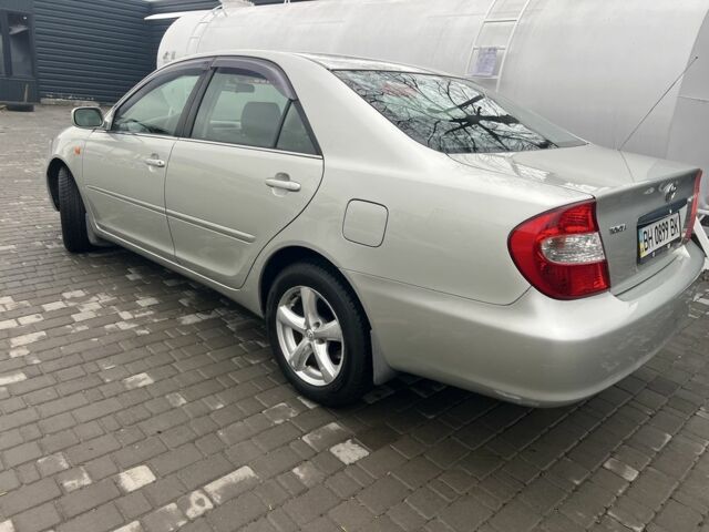 Сірий Тойота Камрі, об'ємом двигуна 2.4 л та пробігом 216 тис. км за 5999 $, фото 5 на Automoto.ua