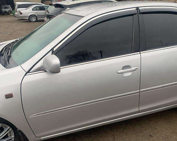 Сірий Тойота Камрі, об'ємом двигуна 2.4 л та пробігом 432 тис. км за 4600 $, фото 2 на Automoto.ua