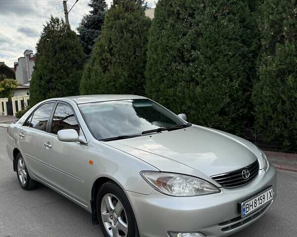 Сірий Тойота Камрі, об'ємом двигуна 3 л та пробігом 215 тис. км за 6800 $, фото 4 на Automoto.ua