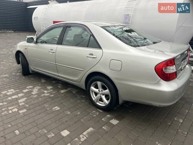 Сірий Тойота Камрі, об'ємом двигуна 2.4 л та пробігом 216 тис. км за 5999 $, фото 17 на Automoto.ua