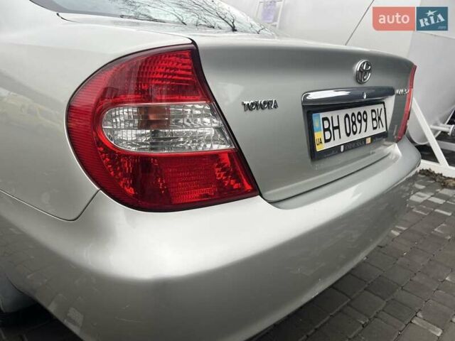 Сірий Тойота Камрі, об'ємом двигуна 2.4 л та пробігом 216 тис. км за 5999 $, фото 23 на Automoto.ua