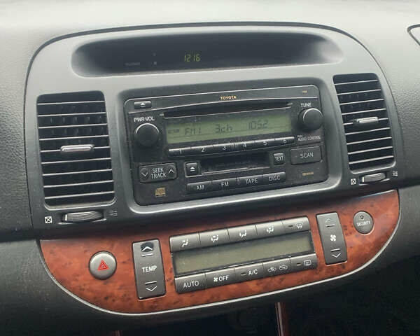 Сірий Тойота Камрі, об'ємом двигуна 2.4 л та пробігом 432 тис. км за 4600 $, фото 25 на Automoto.ua