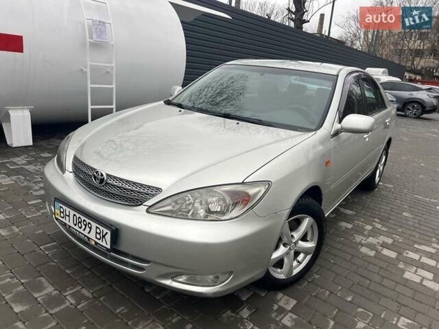 Сірий Тойота Камрі, об'ємом двигуна 2.4 л та пробігом 216 тис. км за 5999 $, фото 14 на Automoto.ua