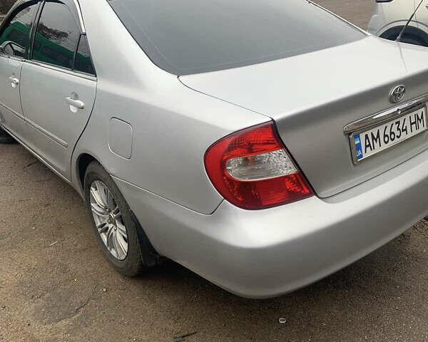 Сірий Тойота Камрі, об'ємом двигуна 2.4 л та пробігом 432 тис. км за 4600 $, фото 4 на Automoto.ua