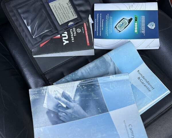 Сірий Тойота Камрі, об'ємом двигуна 3 л та пробігом 215 тис. км за 6800 $, фото 65 на Automoto.ua