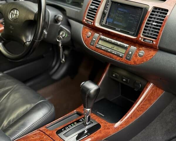 Сірий Тойота Камрі, об'ємом двигуна 3 л та пробігом 215 тис. км за 6800 $, фото 21 на Automoto.ua