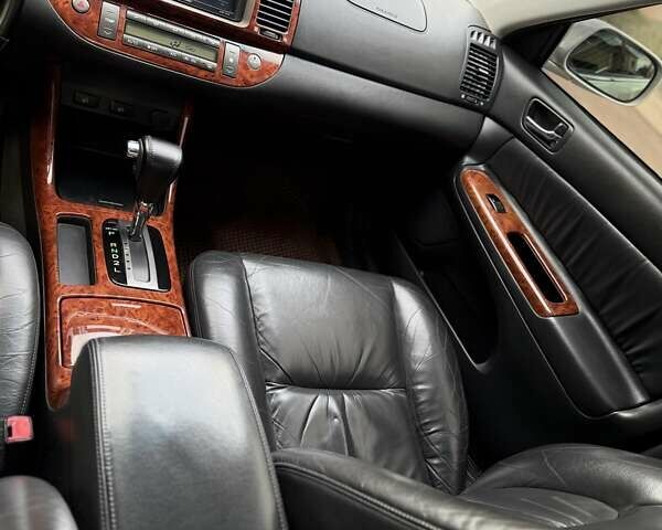 Сірий Тойота Камрі, об'ємом двигуна 3 л та пробігом 215 тис. км за 6800 $, фото 23 на Automoto.ua