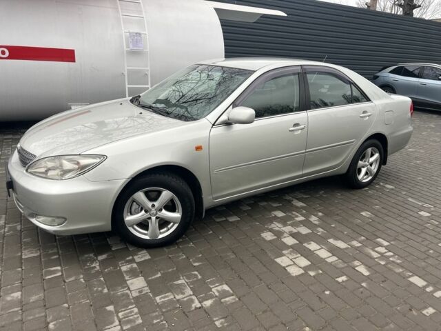 Сірий Тойота Камрі, об'ємом двигуна 2.4 л та пробігом 216 тис. км за 5999 $, фото 1 на Automoto.ua