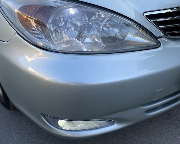 Сірий Тойота Камрі, об'ємом двигуна 3 л та пробігом 215 тис. км за 6800 $, фото 49 на Automoto.ua