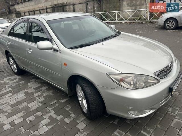 Сірий Тойота Камрі, об'ємом двигуна 2.4 л та пробігом 216 тис. км за 5999 $, фото 7 на Automoto.ua