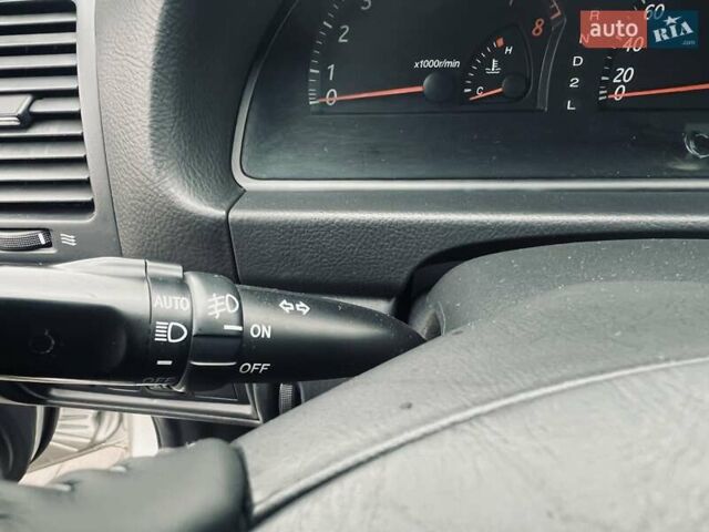 Сірий Тойота Камрі, об'ємом двигуна 2.4 л та пробігом 216 тис. км за 5999 $, фото 36 на Automoto.ua