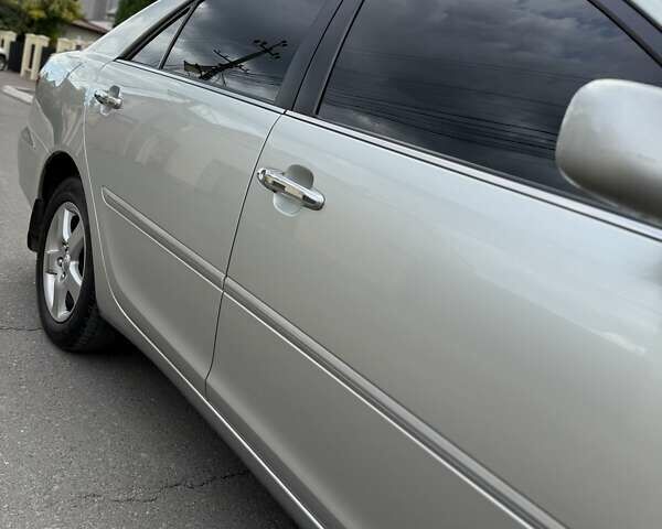 Сірий Тойота Камрі, об'ємом двигуна 3 л та пробігом 215 тис. км за 6800 $, фото 17 на Automoto.ua