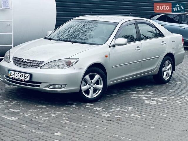 Сірий Тойота Камрі, об'ємом двигуна 2.4 л та пробігом 216 тис. км за 5999 $, фото 3 на Automoto.ua