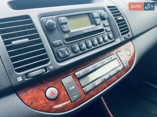 Сірий Тойота Камрі, об'ємом двигуна 2.4 л та пробігом 216 тис. км за 5999 $, фото 33 на Automoto.ua