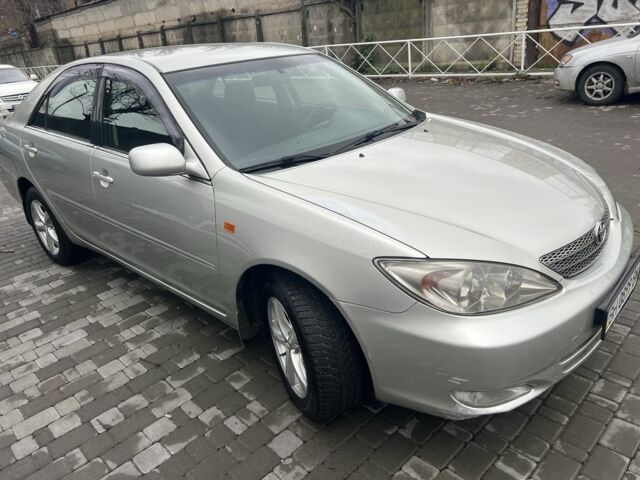 Сірий Тойота Камрі, об'ємом двигуна 2.4 л та пробігом 216 тис. км за 5999 $, фото 3 на Automoto.ua