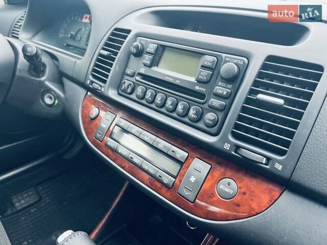 Сірий Тойота Камрі, об'ємом двигуна 2.4 л та пробігом 216 тис. км за 5999 $, фото 28 на Automoto.ua