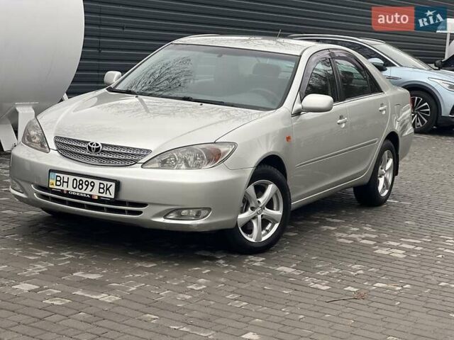 Сірий Тойота Камрі, об'ємом двигуна 2.4 л та пробігом 216 тис. км за 5999 $, фото 2 на Automoto.ua