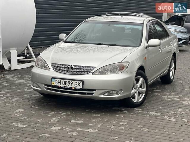 Сірий Тойота Камрі, об'ємом двигуна 2.4 л та пробігом 216 тис. км за 5999 $, фото 4 на Automoto.ua