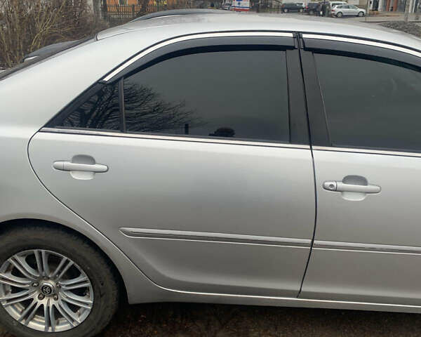 Сірий Тойота Камрі, об'ємом двигуна 2.4 л та пробігом 432 тис. км за 4600 $, фото 7 на Automoto.ua